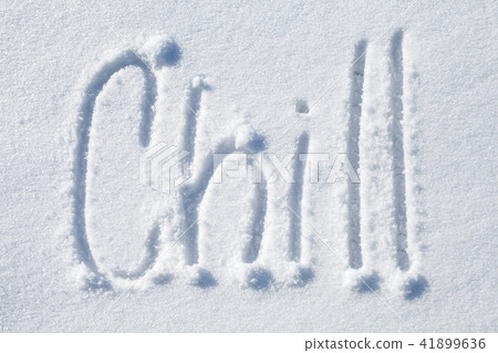 Chill. Hand drawn text over white snow Chill. Hand drawn text over white snow 41899636