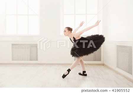 Beautiful graceful ballerina in black swan dress 41905552