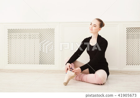 Ballet dancer wearing gaiters closeup Ballet dancer wearing gaiters closeup 41905673