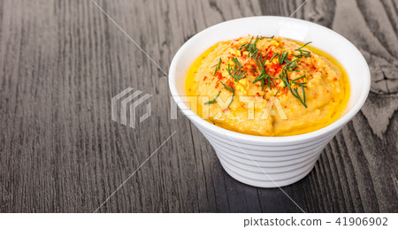 hummus in a bowl close-up 41906902
