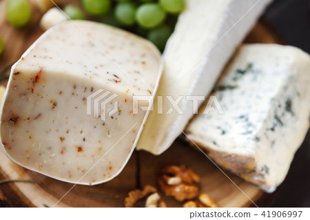 Different sorts of cheese, food background 41906997