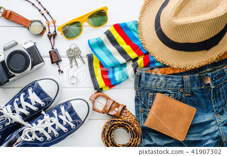 Travel accessories and costume on white background Travel accessories and costume on white background 41907302