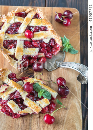 Cherry pie on the wooden board 41907751