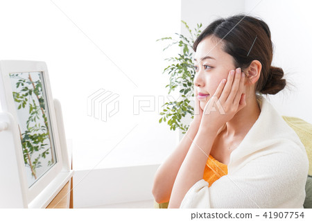 A young woman who skincare in the room A young woman who skincare in the room 41907754