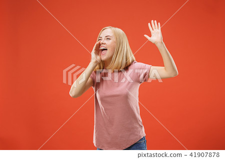 A portrait of surprised screaming woman 41907878