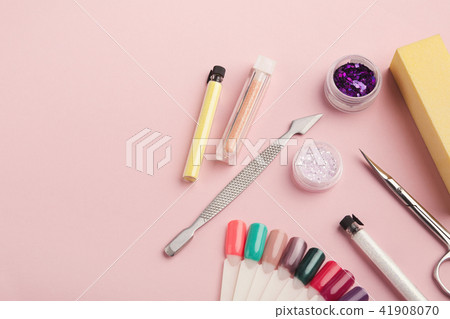 Manicure supplies on pink background Manicure supplies on pink background 41908070