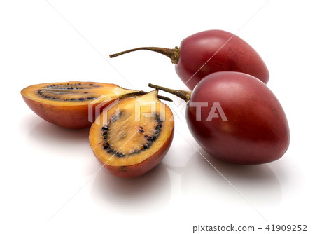 Fresh raw tamarillo isolated on white Fresh raw tamarillo isolated on white 41909252