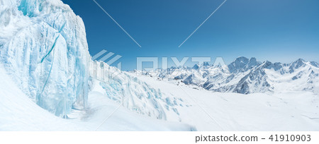 Winter snow covered mountain peaks in Caucasus. Great place for winter sports 41910903