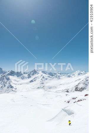 Winter snow covered mountain peaks in Caucasus. Great place for winter sports 41910904