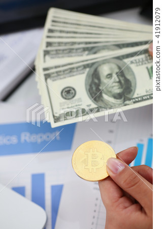 businessmen change currency make successful deal hold money in arms businessmen change currency make successful deal hold money in arms 41912079