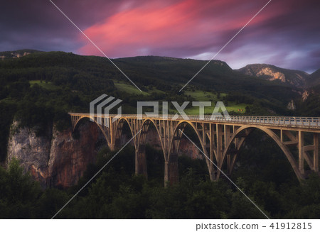 Sunset over the Hills with a Bridge 41912815