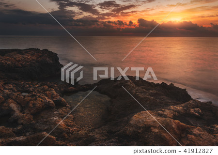 Rocky Beach at Sunset 41912827