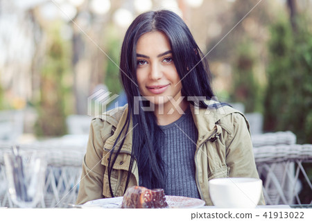 woman smiling outdoors on restaurant cafe terrace woman smiling outdoors on restaurant cafe terrace 41913022