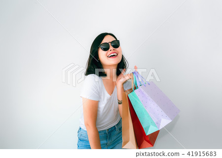 Woman wears white t-shirt and jean Woman wears white t-shirt and jean 41915683