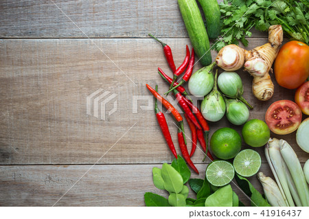 Mix of Thai vegetable in bamboo tray on wooden background. 41916437