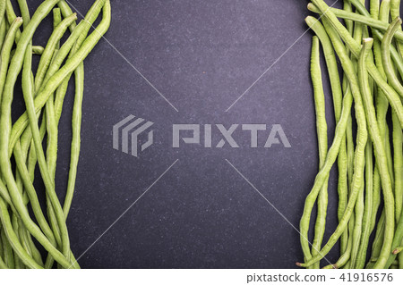 Top view fresh green cowpea or Asparagus bean on black stone Top view fresh green cowpea or Asparagus bean on black stone 41916576