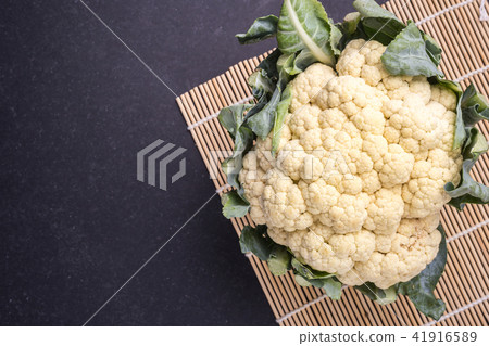 Top view fresh Cauliflower on black stone 41916589