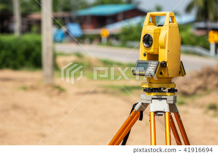 Surveyor engineer making measure at the land 41916694
