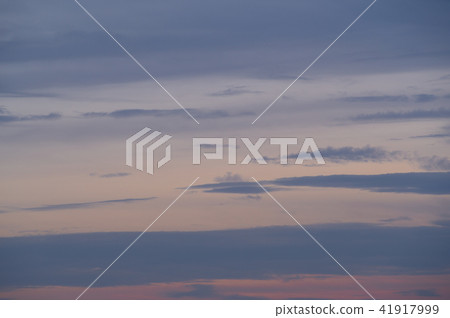 Background of clouds clinging to the evening sky a 41917999