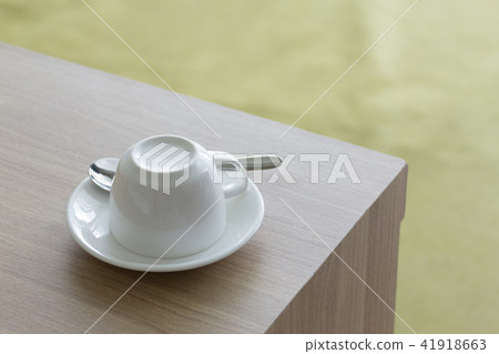 White cups coffee set on wooden table. White cups coffee set on wooden table. 41918663