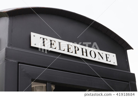 Vintage big black pay phone. Vintage big black pay phone. 41918684
