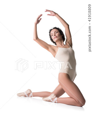 Graceful girl on pointe on the floor isolated view 41918809