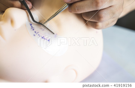 eyelashes on a silicone mannequin.  41919156