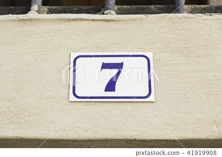 Number seven on a wall 41919908