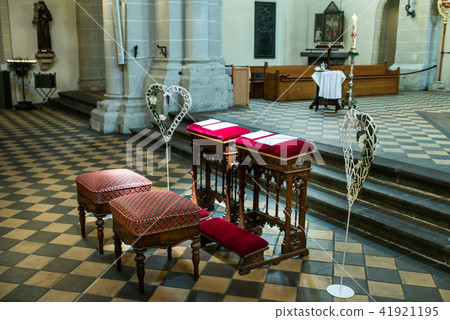 Wedding arrangement chairs inside The Basilica of St. Castor oldest church in Koblenz German state 41921195