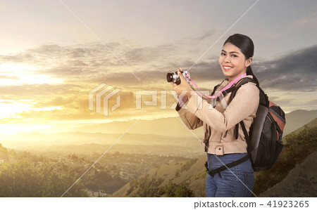 Beautiful asian photographer woman with camera  41923265