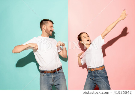 A couple of young man and woman dancing hip-hop at studio. 41925842