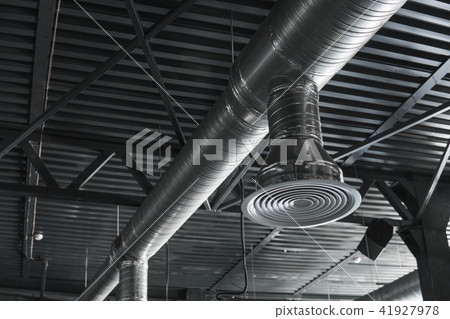 Ventilation system on the ceiling of large buildings. Ventilation pipes in silver insulation 41927978
