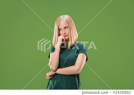 Beautiful woman looking suprised and bewildered 41930802