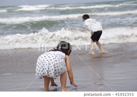Brother sister playing in the sea Brother sister playing in the sea 41932353