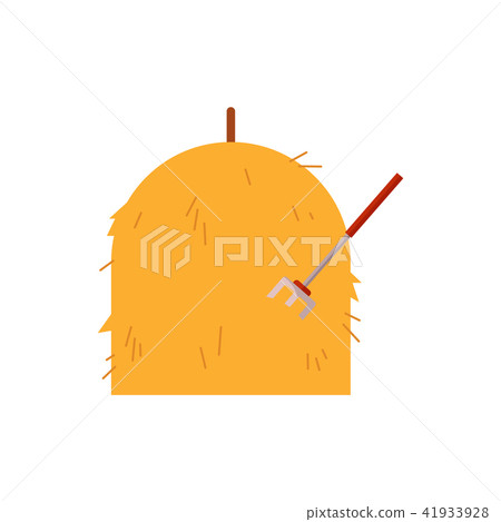 Haystack with pitchfork inside - pile of dry straw with agricultural equipment. 41933928