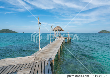 Wooden pier with boat in Phuket, Thailand. 41934126