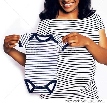 young pretty african american woman pregnant happy smiling, posi young pretty african american woman pregnant happy smiling, posi 41934555