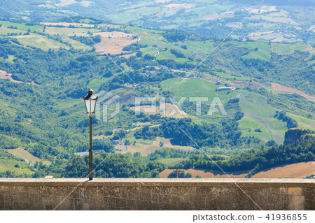Alone street lamp with a nature landscape. Alone street lamp with a nature landscape. 41936855