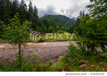 A beautiful landscape with the tops of mountains e A beautiful landscape with the tops of mountains e 41938359