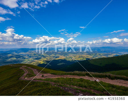 A magnificent landscape of mountains and valleys w A magnificent landscape of mountains and valleys w 41938368