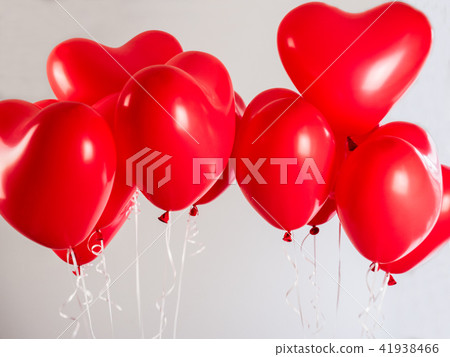 Red balloons in the shape of a heart 41938466