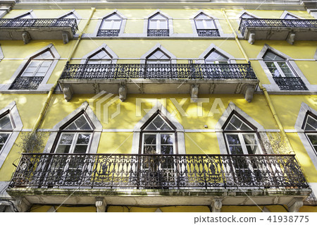 Old yellow facade Old yellow facade 41938775