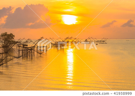 sunshine at  fishing trap at Pak Pra in Talay Noi 41938999