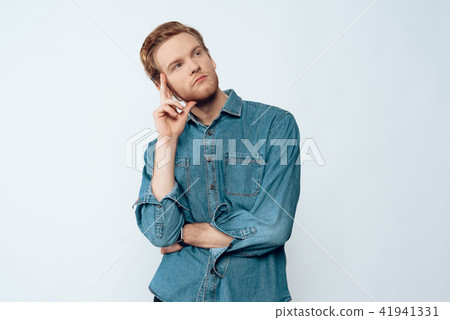 Portrait of Handsome Serious Pensive Man 41941331