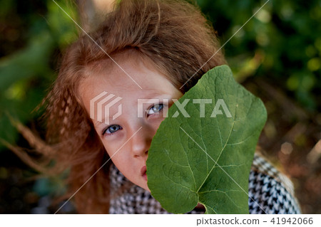 The baby is 4 years old, with blue eyes and small curls. Children's enjoyment of life and adventures 41942066