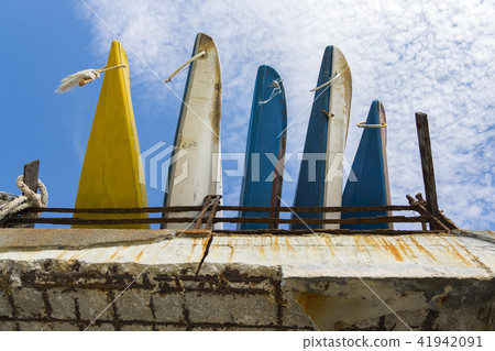 stacking kayaks over cloudy sky background 41942091