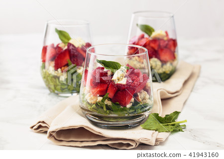 Spinach salad in glass. 41943160