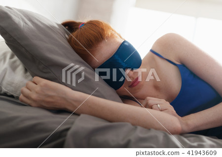 Woman In Bed Sleeping With Sleep Mask On Eyes 41943609