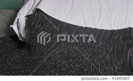 Plastic black gray granulated crumb. Manufacture of plastic water pipes factory. Process of making 41945807