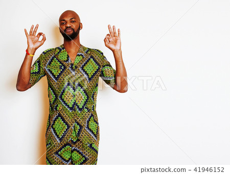 portrait of young handsome african man wearing bright green nati 41946152